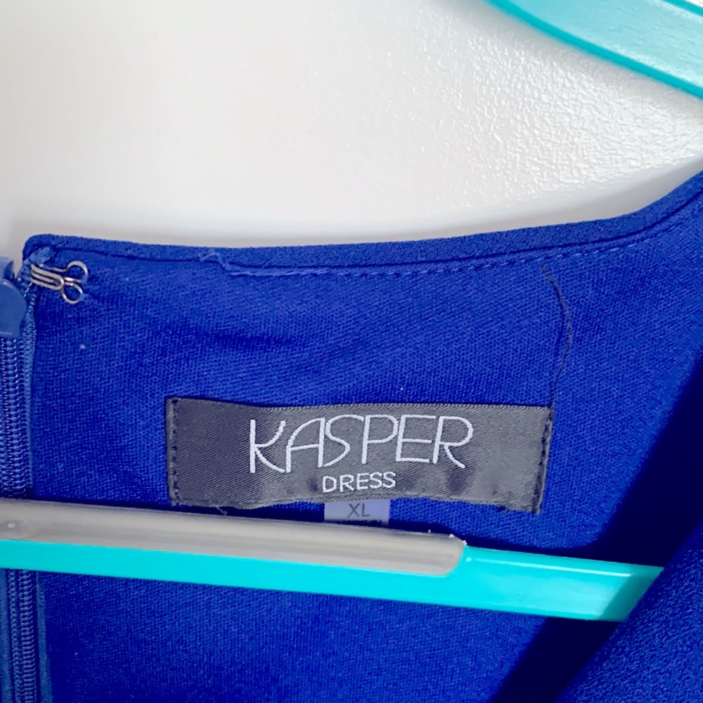 Kasper - bell sleeve high waisted dress with ruffle on the bottom of dress.